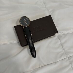 Daniel Wellington Black and Gold Watch